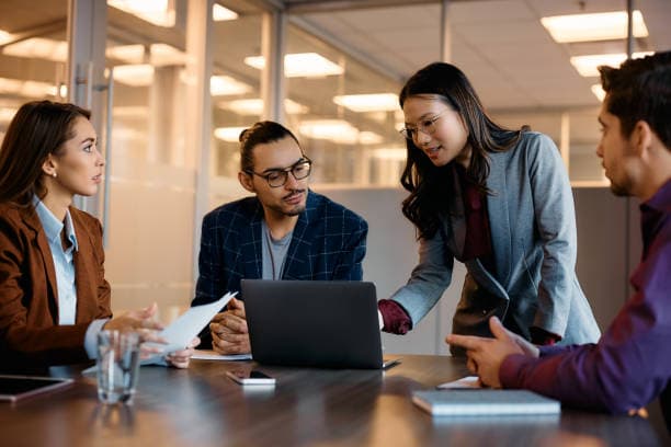 Yova Technologies consultants discussing